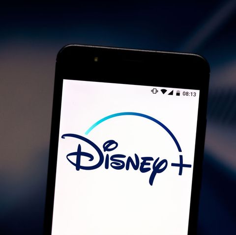 In this photo illustration a Disney+ (Plus) logo seen...