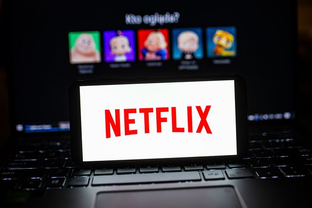 in this photo illustration a netflix logo seen displayed on