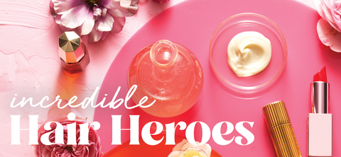 incredible hair heroes product section vintage beauty products and perfume bottles on pink background