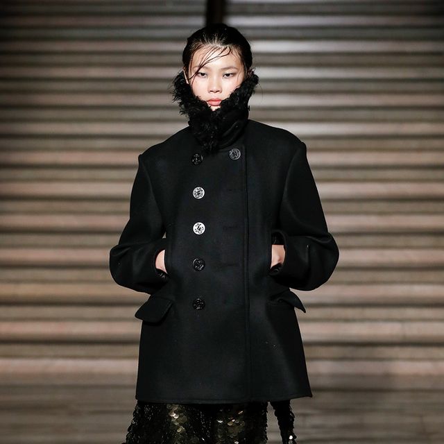 a model wears a peacoat in a roundup of the best peacoats for women 2022