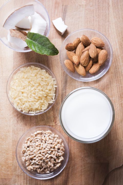 Ingredients for vegan milk; almonds, rice, spelt and coconut