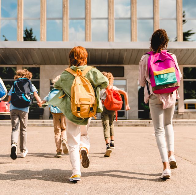 inspiring education quotes illustrated by photo of young students wearing backpacks headed to school
