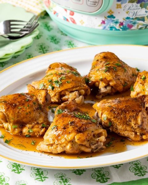 instant pot chicken thighs on platter with sauce