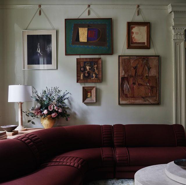 design showhouse parlor with red sofa