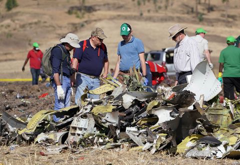 Emergency Services Work At The Crash Site Near Bishoftu Of Ethiopian Airlines ET302 To Nairobi