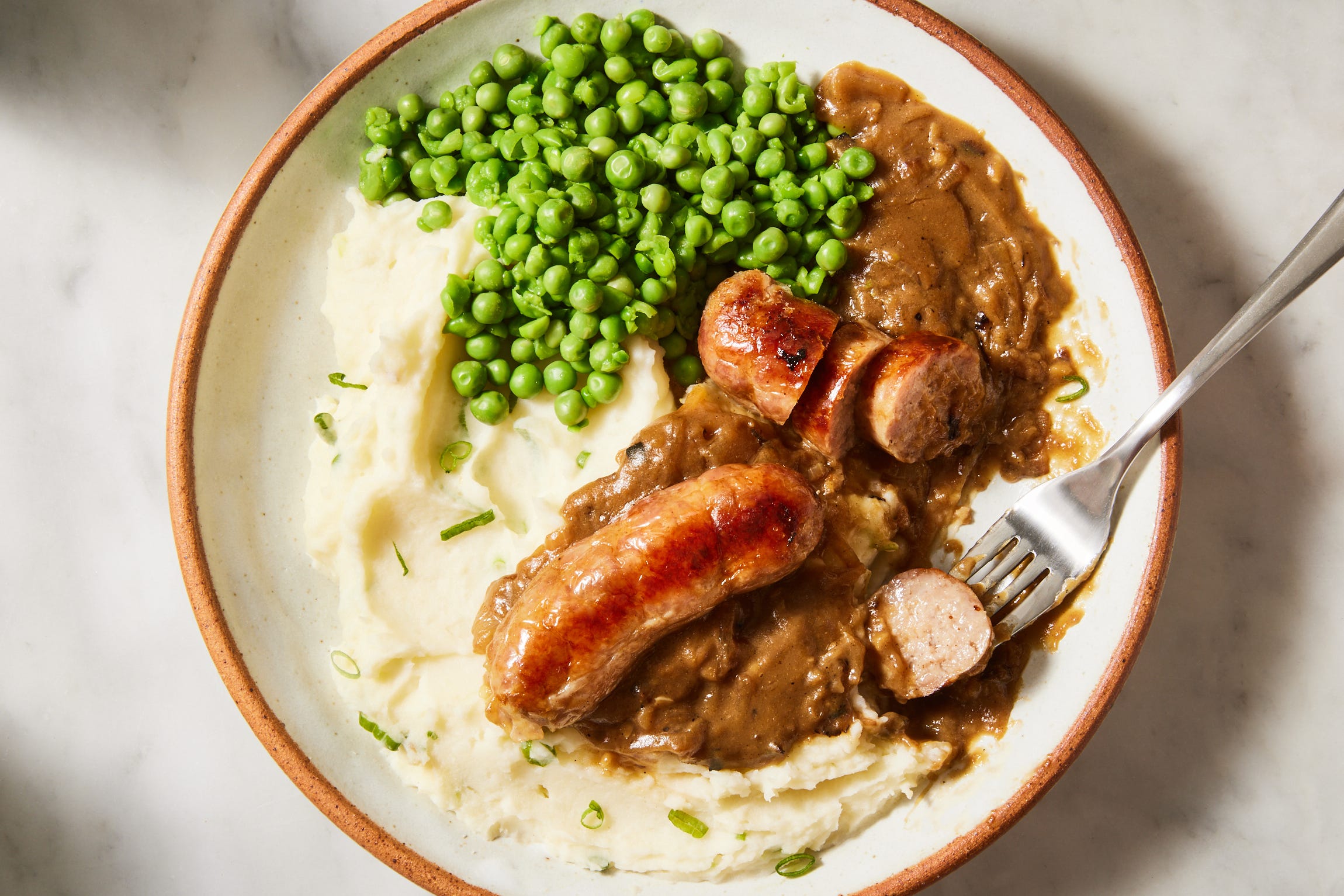 Celebrate St. Patrick's Day With Traditional Irish Sausages & Champ