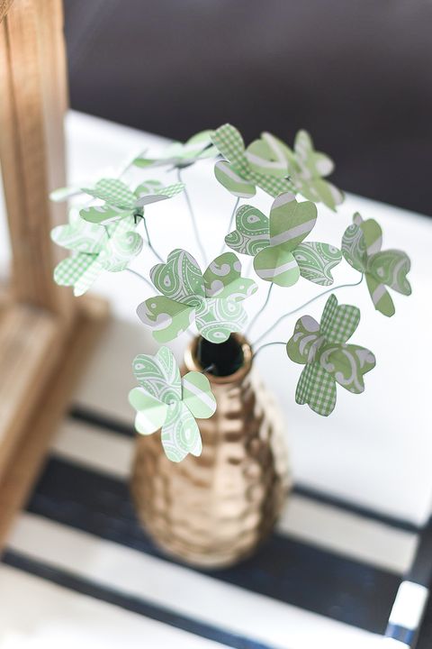 shamrock bouquet in vase made with green and white patterned scrapbook paper for the leaves