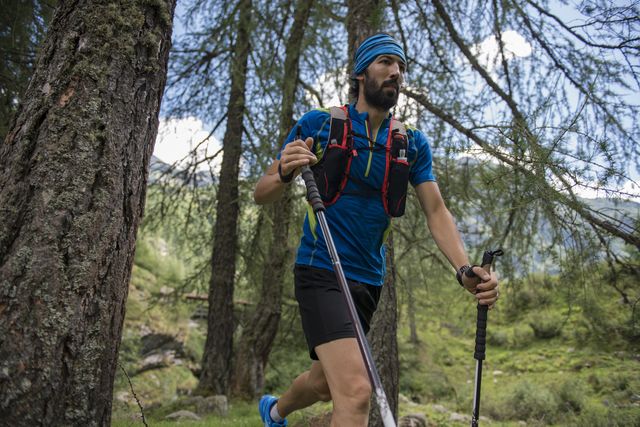 italy, alagna, trail runner on the move in forest