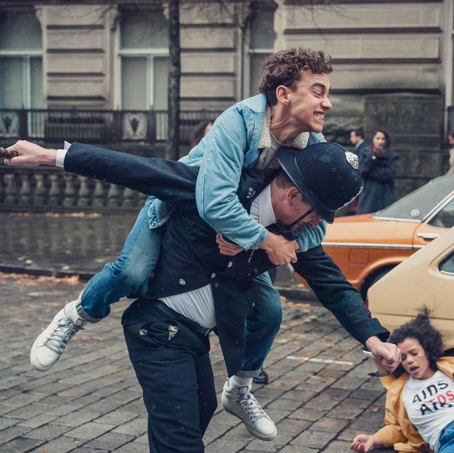 olly alexander as richie on top of policeman lydiawest as jill on the floor