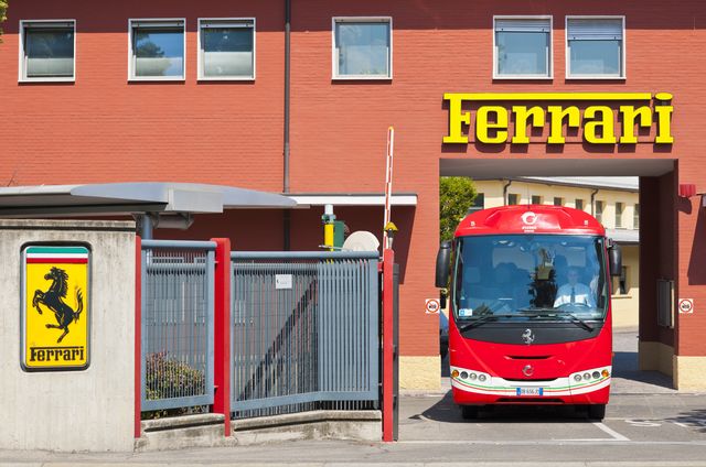 iveco bus leaves original old ferrari formula one factory entrance