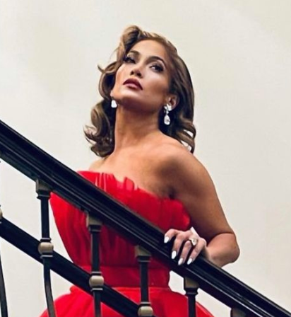 Jennifer Lopez Looks Stunning in This Red Tiered Christmas Eve Dress