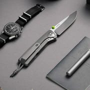James Brand barnes a pocket knife on a table with other items