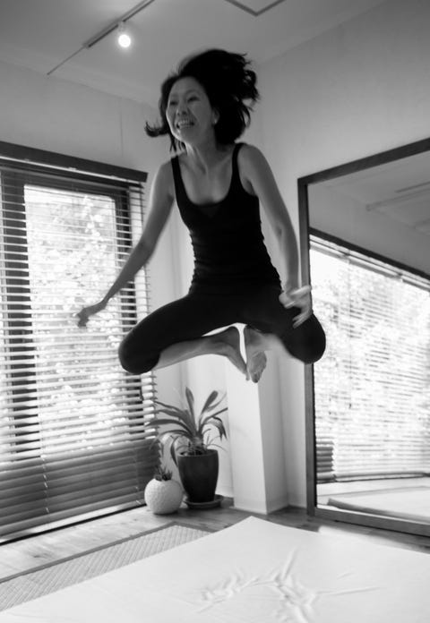 japanese female jumping as physical exercise in kyoto japan