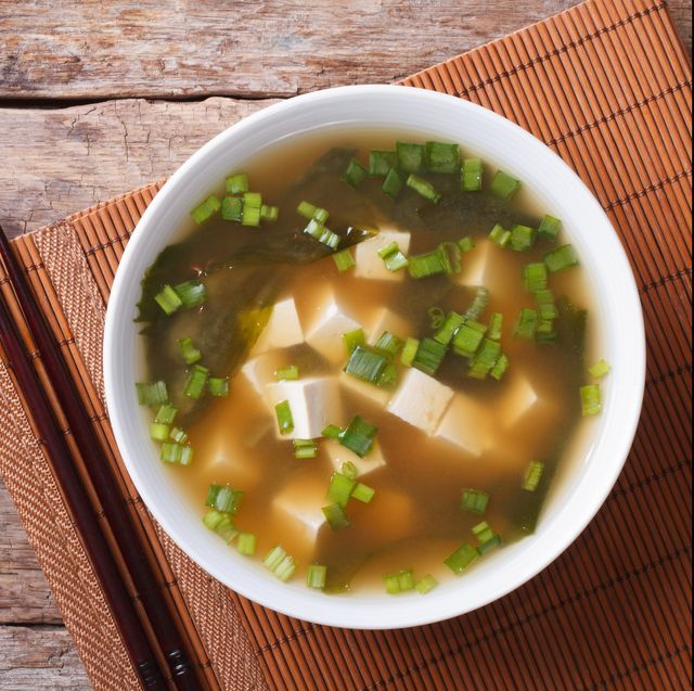 japanese miso soup in a white bowl horizontal top view