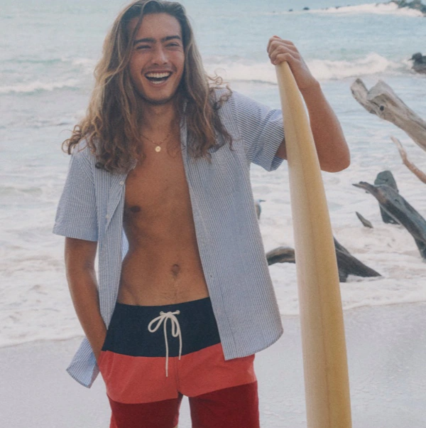 guy with surfboard