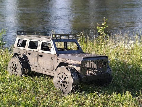 one of tt custom fab’s jeep fire pits in raw steel
