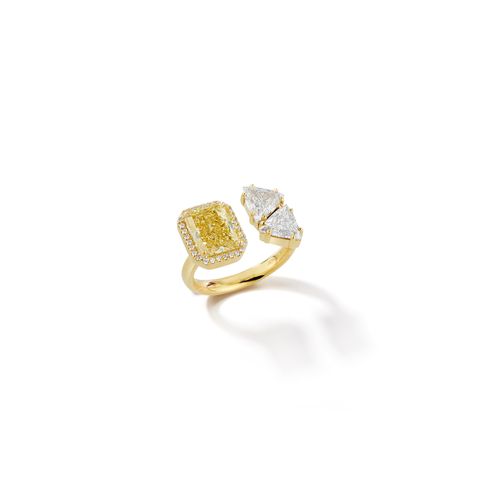 jemma wynne reimagined a client’s classic three stone ring in a modern open design