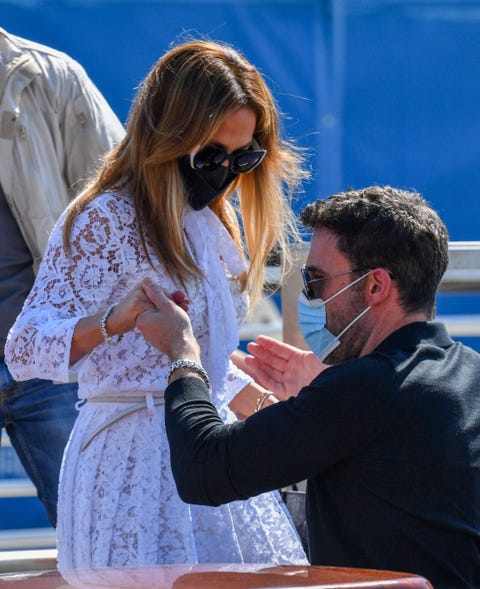 Jennifer Lopez and Ben Affleck attend the Venice Film Festival and Jlo shines in a white lace-up Valentino dress in her daytime look