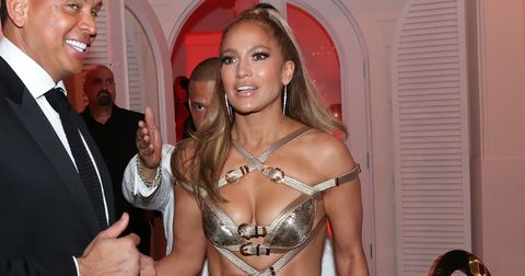 Jennifer Lopez wears sexy gold dress for 50th birthday
