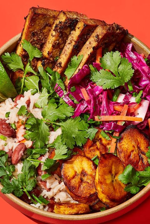 jerk tofu rice bowl with kidney beans, plantains, cabbage and carrot slaw, and cilantro