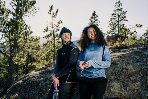 man and woman hiking