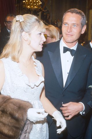 Joanne Woodward and Paul Newman at the premiere of Cool Hand Luke