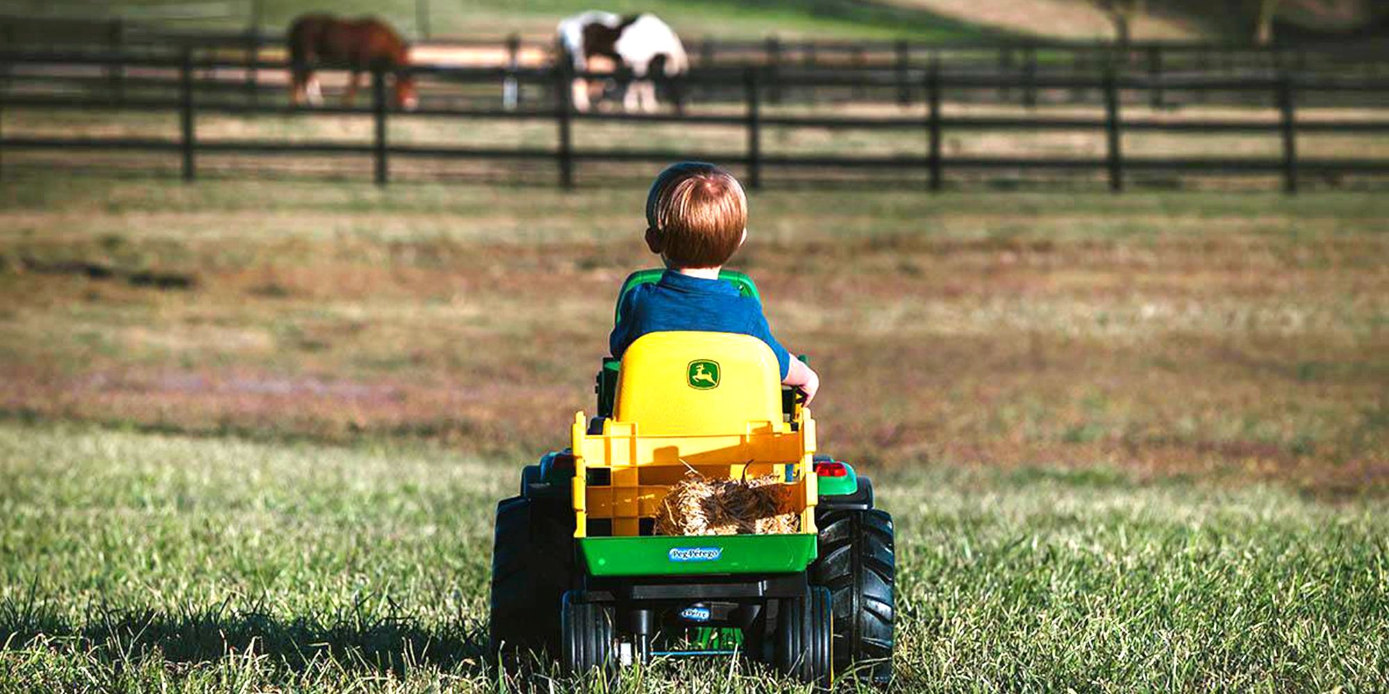 kids playing with tractors