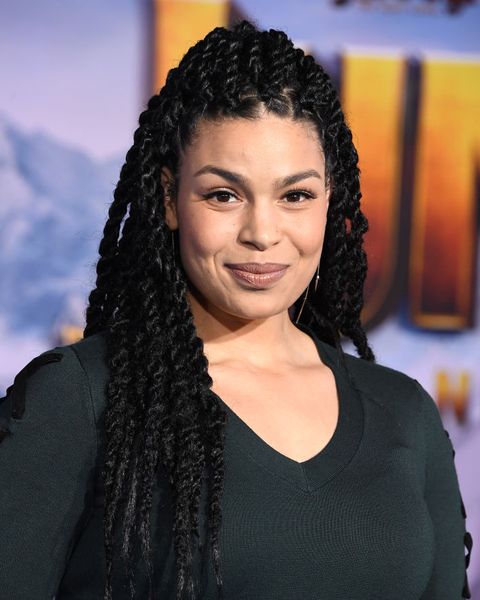 jordin sparks wears a black long sleeved shirt and braids on the red carpet