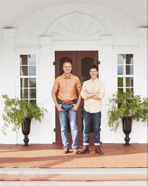josh kilmer purcell and brent ridge standing by their front door