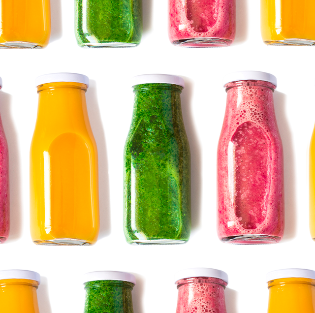 green, orange, and pink juice with clear bottles and white lids repeated in rows