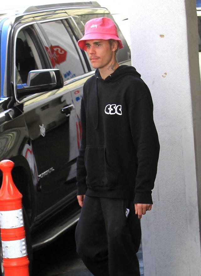 Justin Bieber's Pink Bucket Hat Is the Dash of Sleaze Your 2020 Look Needs