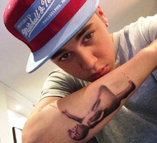 Justin Biebers Tattoos The Meaning Behind Justin Biebers Tattoos