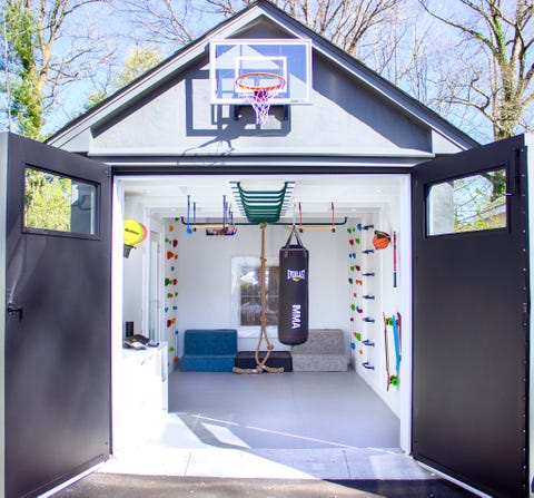 a one car garage turned into a playroom by smart d2 playrooms