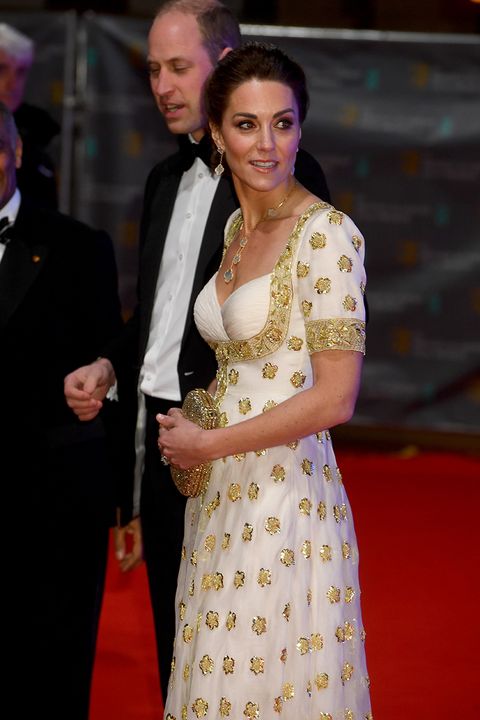 Kate Middleton wears a white and gold dress for BAFTA red carpet