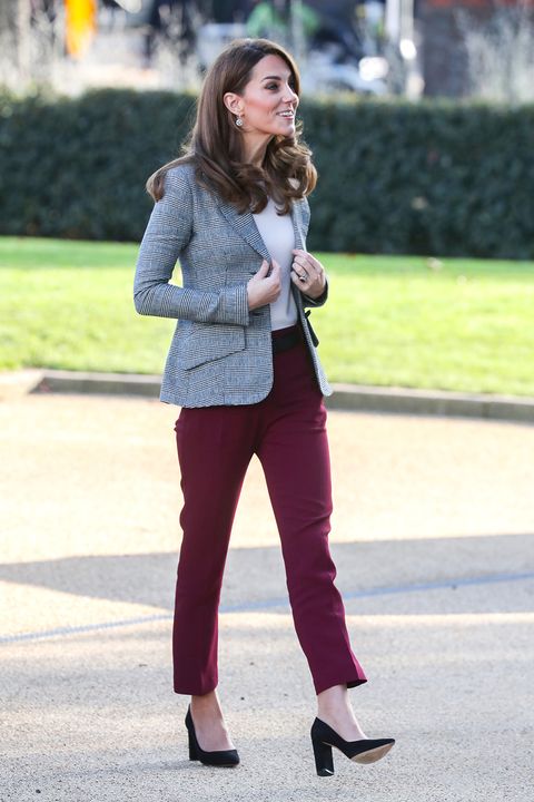 Kate Middleton wears grey check blazer and red trousers for event