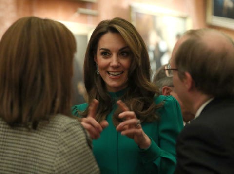 Kate Middleton wears festive green dress at Buckingham Palace