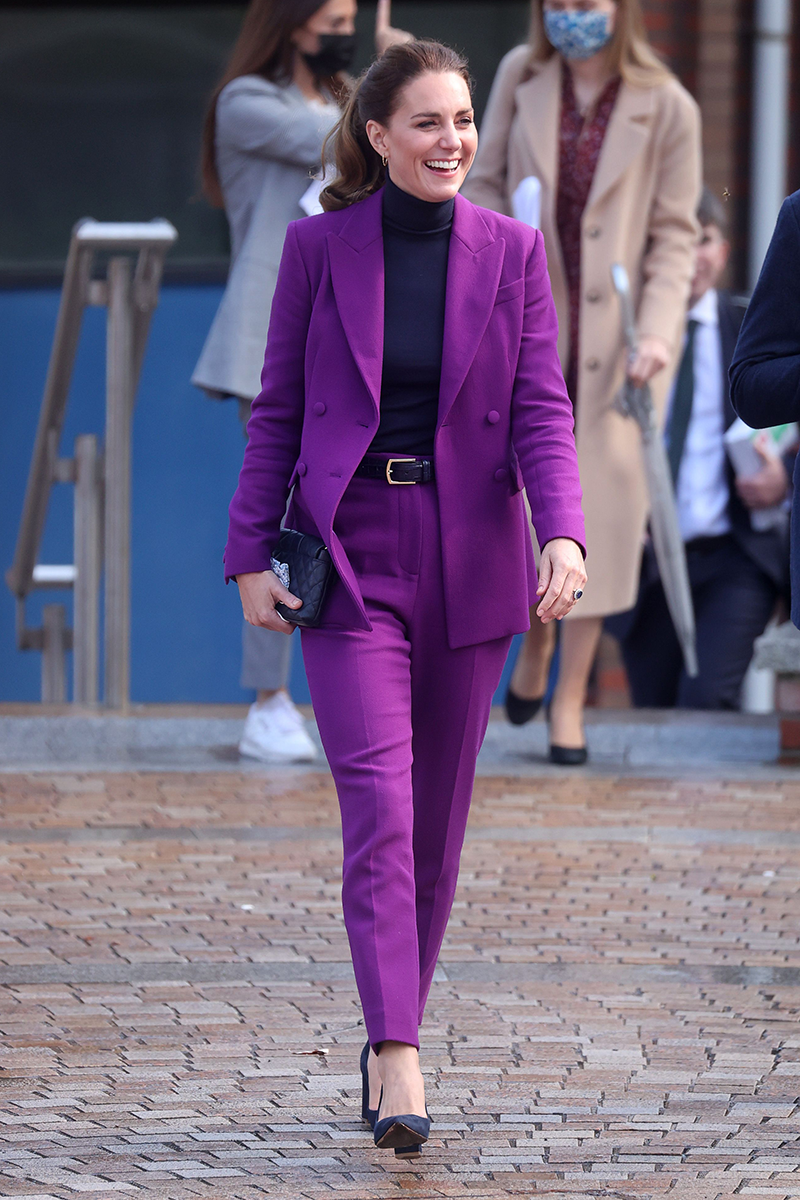 Kate Middleton wears a purple trouser suit by Emilia Wickstead