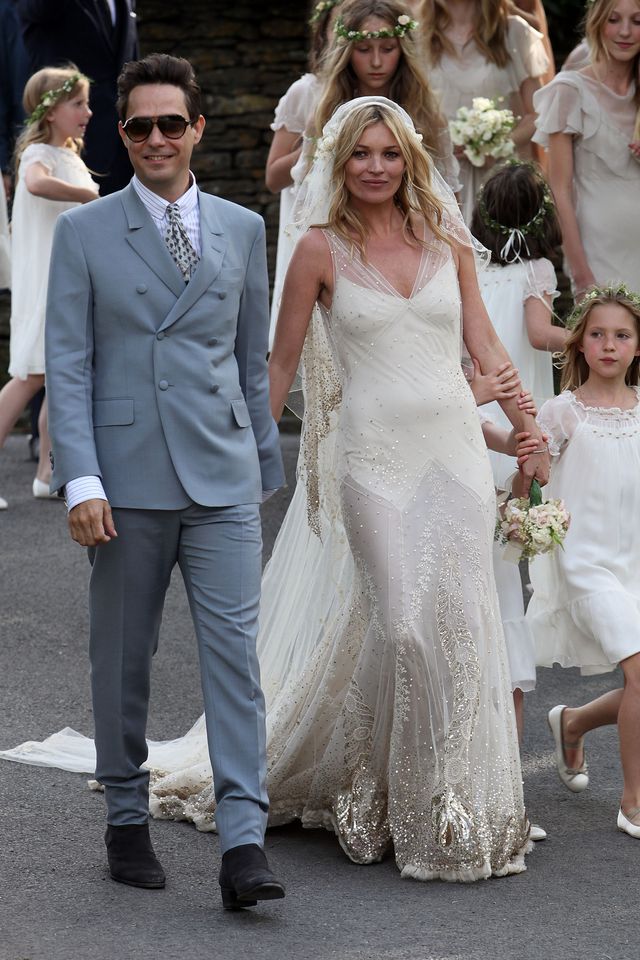 southrop, united kingdom   july 01 kate moss and jamie hince outside the church after their wedding on july 1, 2011 in southrop, england photo by neil mockfordfilmmagic