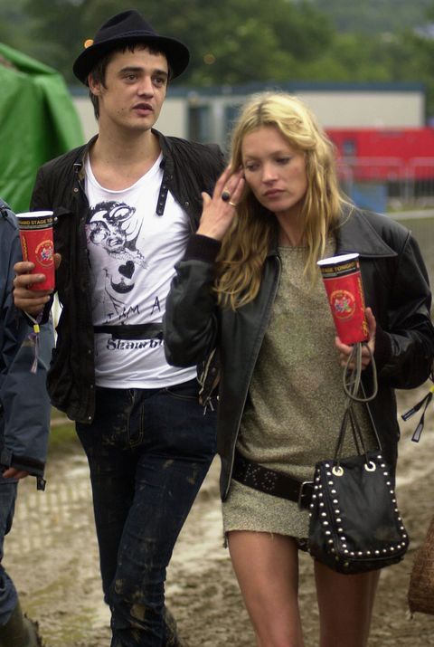 glastonbury, england   june 25 kate moss and pete doherty walk backstage on the second day of the glastonbury music festival 2005 at worthy farm, pilton on june 25, 2005 in somerset, england pete doherty was at the festival to perform with his band babyshambles the festival runs until june 26 photo by matt cardygetty images
