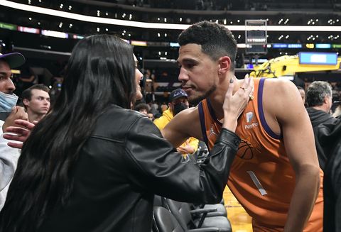 kendall jenner and devin booker lean in for a huge after the phoenix suns v los angeles lakers game that the sun won