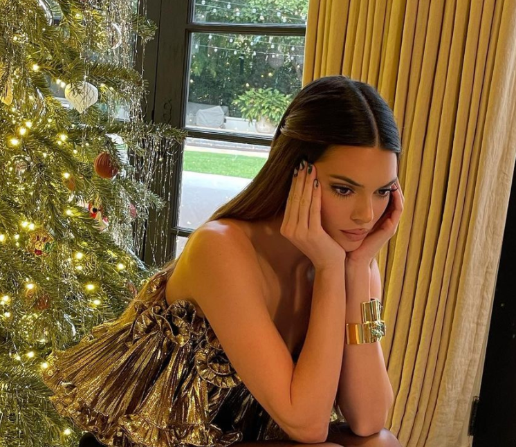 Kendall Jenner Dressed Like a Sexy Gold Present for Christmas Eve