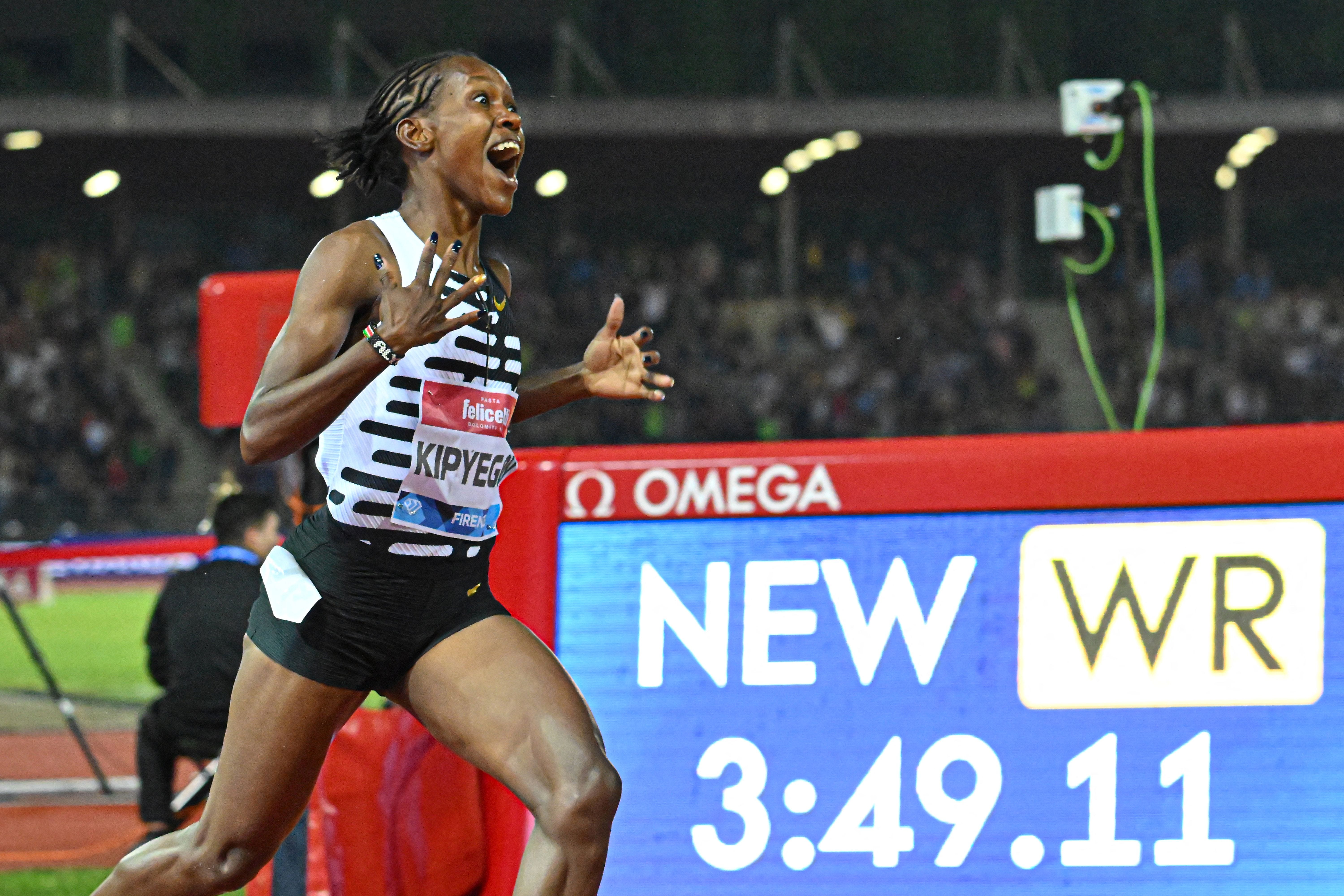 World Record! Faith Kipyegon Runs 3:49.11 for 1500 Meters