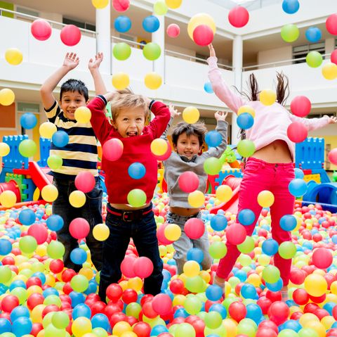 kids playing at a ball pool