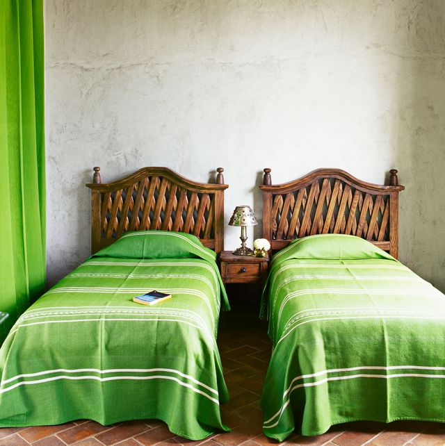 kids room with green twin beds