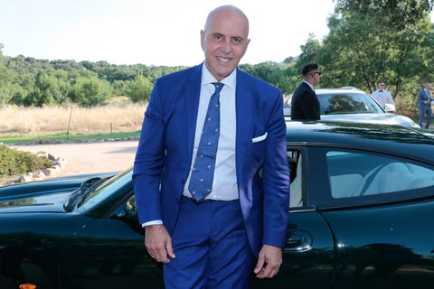 Land vehicle, Vehicle, Car, Luxury vehicle, Electric blue, Automotive design, Outerwear, Suit, Mid-size car, Performance car, 