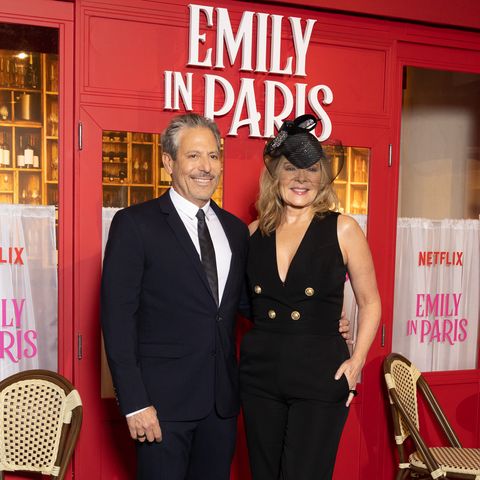 paris, france december 06 lr darren star and kim cattrall attend the emily in paris season 3 world premiere at the champs elysées theater on december 06, 2022 in paris, france photo by marc piaseckiwireimage
