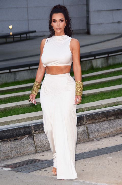 Continental battery replica Kim Kardashian goes bra-free in a teeny tiny crop top at the CFDA awards