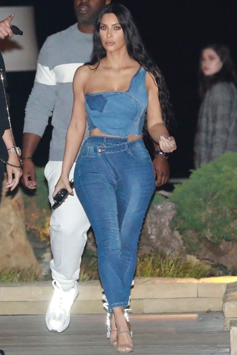 Kim Kardashian wore a denim jeans and 