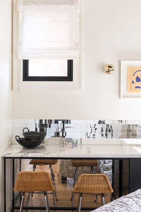 kitchen with mirrored tile backsplash
