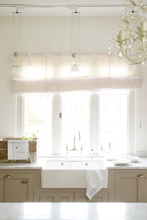 kitchen with baby pink curtains